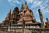 Thailand, Old Sukhothai - Wat Mahathat, the main chedi is composed by a platform with a chedi in the centre, with the characteristic shape of a lotus bud, surrounded by eight smaller chedi at the cardinal points.  